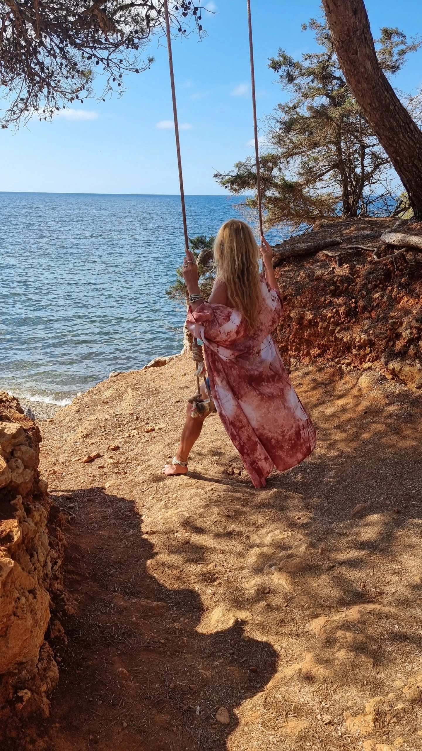 De schommel van Cala Pada, secret spot op Ibiza